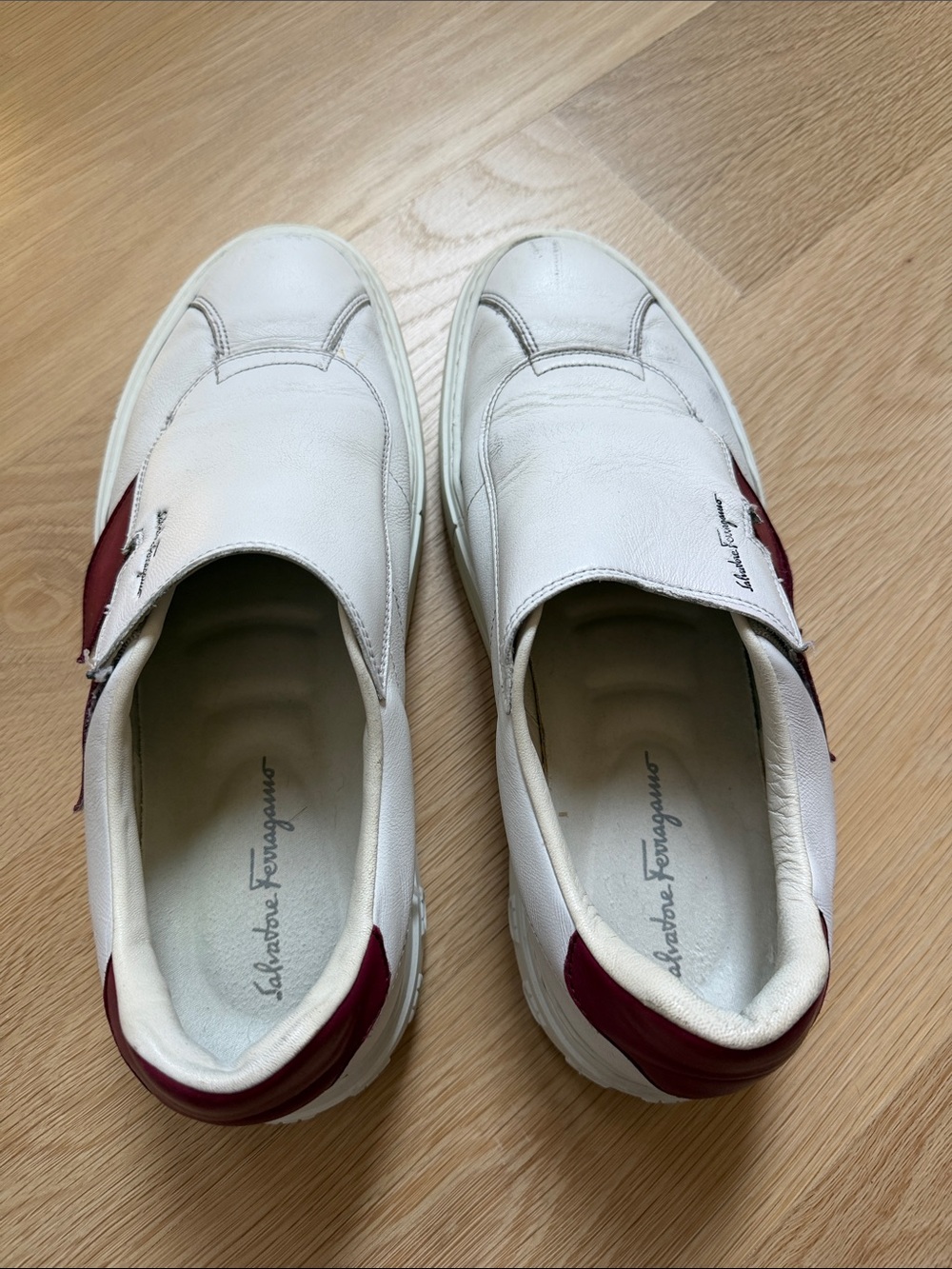 Salvatore Ferragamo White Slip-On Sneakers with Burgundy Accents
